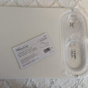 Pampered Chef cutting board with measuring cups